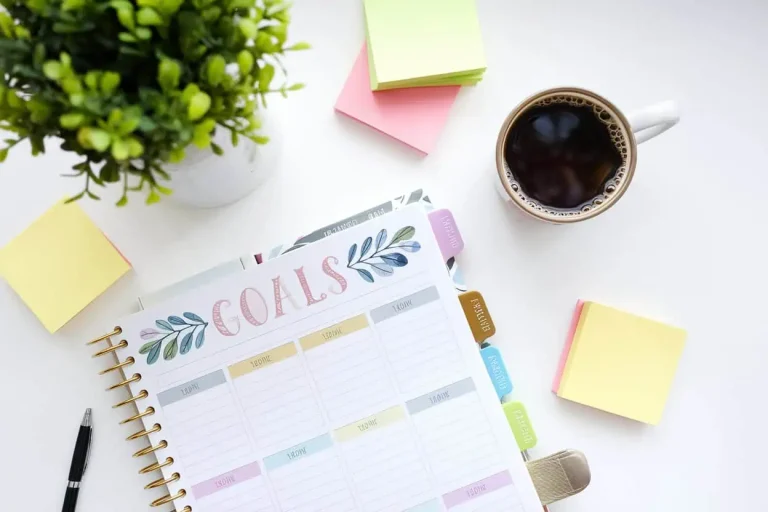 a-bright-inviting-flat-lay-workspace-with-goals-workbook